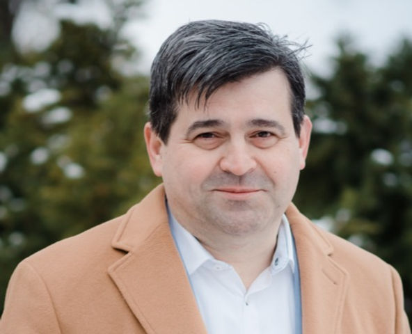 photo of a man in a coat